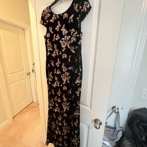 Black velvet gown with rose gold sequins